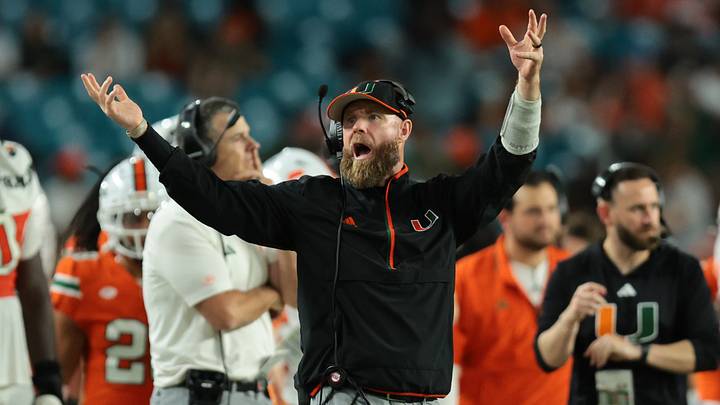 Nov 15, 2025; Miami Gardens, Florida, USA; against the Miami Hurricanes defensive coordinator Corey Hetherman reacts on the sideline against NC State Wolfpack during the fourth quarter at Hard Rock Stadium. Mandatory Credit: Sam Navarro-Imagn Images Nov 15, 2025; Miami Gardens, Florida, USA; against the Miami Hurricanes defensive coordinator Corey Hetherman reacts on the sideline against NC State Wolfpack during the fourth quarter at Hard Rock Stadium. Mandatory Credit: Sam Navarro-Imagn Images