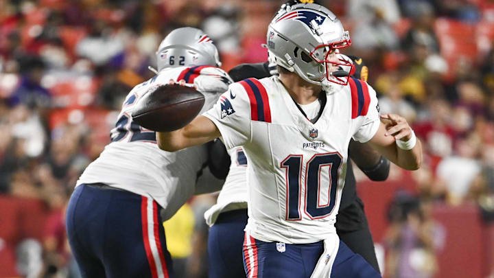 Aug 25, 2024; Landover, Maryland, USA; New England Patriots quarterback Drake Maye (10) throws  during the first half against the Washington Commanders at Commanders Field.