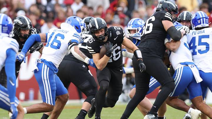 Oct 25, 2025; Ames, Iowa, USA; Iowa State Cyclones running back Carson Hansen (26) runs the football against the BYU Cougars at Jack Trice Stadium. Mandatory Credit: Reese Strickland-Imagn Images Oct 25, 2025; Ames, Iowa, USA; Iowa State Cyclones running back Carson Hansen (26) runs the football against the BYU Cougars at Jack Trice Stadium. Mandatory Credit: Reese Strickland-Imagn Images