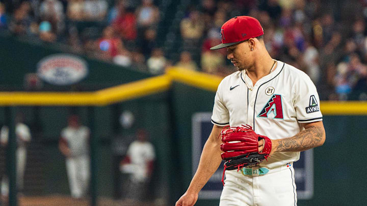 Sep 15, 2024; Phoenix, Arizona, USA; Arizona Diamondbacks pitcher Justin Martinez (63) on the mound in the ninth inning during a game against the Milwaukee Brewers at Chase Field. Mandatory Credit: Allan Henry-Imagn Images