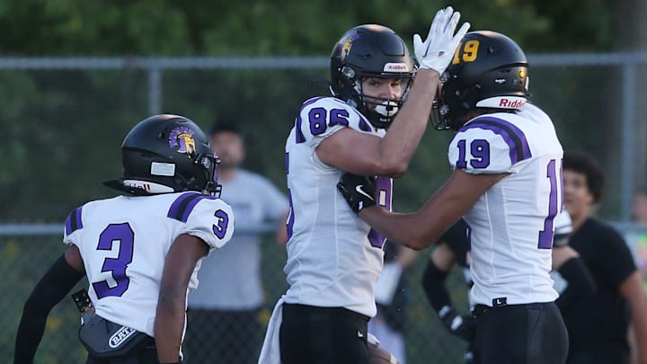 Waukee's tight end Evan Jacobson (86) celebrates with team mates after a touchdown against Ames during the first quarter in the season opening game at Ames High Football field on Friday, Aug. 30, 2024, in Ames, Iowa