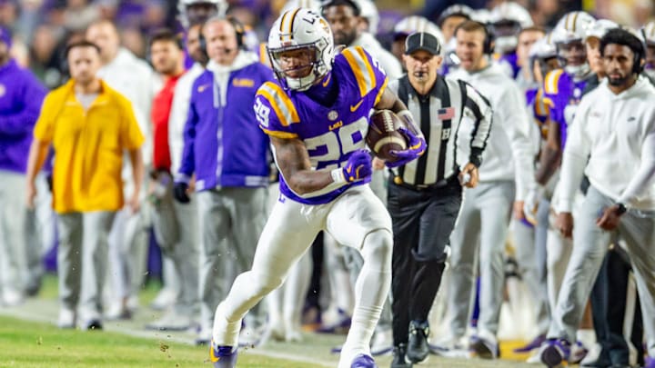 Caden Durham 29 runs the ball as the LSU Tigers take on the Oklahoma Sooners. Nov 30, 2024; Baton Rouge, Louisiana, USA; at Tiger Stadium.