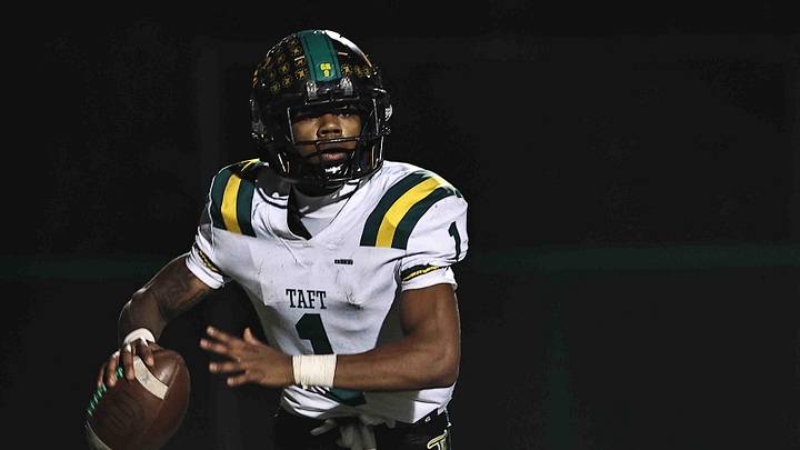 Taft quarterback Monsanna Torbert (1) drops back to pass during the OHSAA Division IV regional semifinal game between Indian Hill and Taft Friday, Nov. 14, 2025. Indian Hill won 25-19.