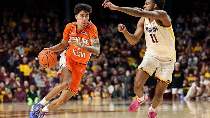 Feb 8, 2025; Minneapolis, Minnesota, USA; Illinois Fighting Illini forward Will Riley (7) drives towards the basket as Minnesota Golden Gophers guard Femi Odukale (11) defends during the second half at Williams Arena. Mandatory Credit: Matt Krohn-Imagn Images