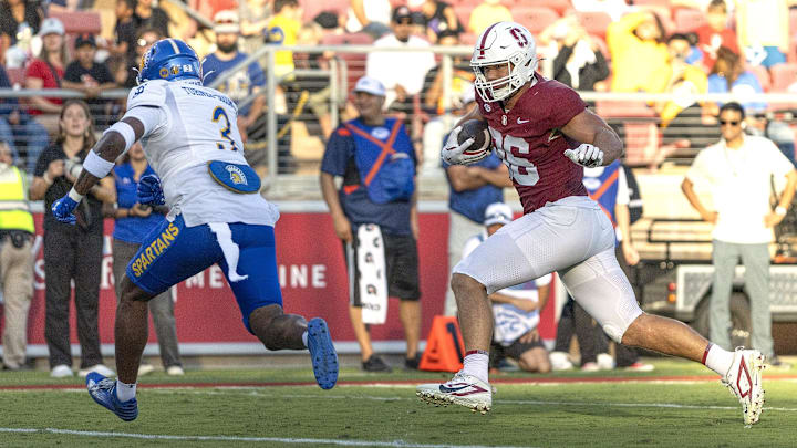 Sep 27, 2025; Stanford, California, USA; Stanford Cardinal tight end Sam Roush (86) runs for a touchdown during the second quarter against San Jose State Spartans safety Larry Turner-Gooden (3) at Stanford Stadium. Mandatory Credit: Stan Szeto-Imagn Images Sep 27, 2025; Stanford, California, USA; Stanford Cardinal tight end Sam Roush (86) runs for a touchdown during the second quarter against San Jose State Spartans safety Larry Turner-Gooden (3) at Stanford Stadium. Mandatory Credit: Stan Szeto-Imagn Images