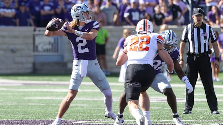 Sep 28, 2024; Manhattan, Kansas, USA; Kansas State Wildcats quarterback Avery Johnson (2) passes the ball against the Oklahoma State Cowboys during the first quarter at Bill Snyder Family Football Stadium. Mandatory Credit: Scott Sewell-Imagn Images