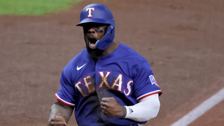Oct 23, 2023; Houston, Texas, USA; Texas Rangers right fielder Adolis Garcia (53) reacts after scoring during the first inning of game seven in the ALCS against the Houston Astros for the 2023 MLB playoffs at Minute Maid Park.  Mandatory Credit: Erik Williams-Imagn Images