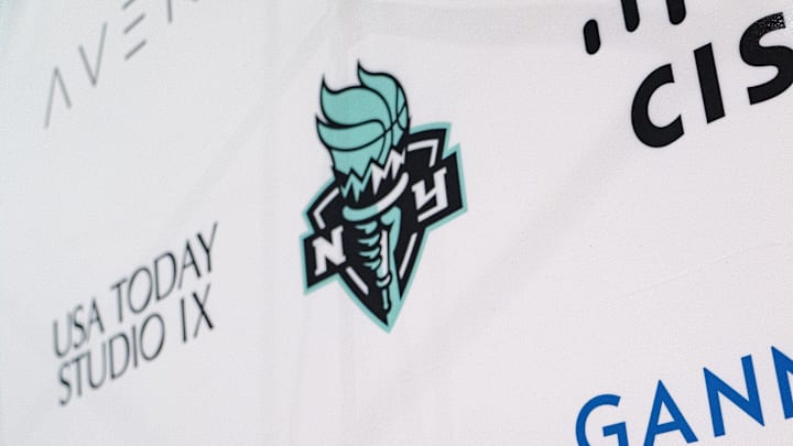 Apr 14, 2025; Brooklyn, New York, USA; A general view of Gannett, USA Today Network, Cisco, NY Liberty and USA TODAY Studio IX logos during a 2025 WNBA Draft watch party at Studio IX. Mandatory Credit: Lucas Boland-USA TODAY