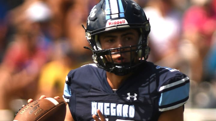 Matthew Boring (12) passed for 291 yards and 4 touchdowns as Hoggard belted Laney, 48-14. Matthew Boring (12) passed for 291 yards and 4 touchdowns as Hoggard belted Laney, 48-14.