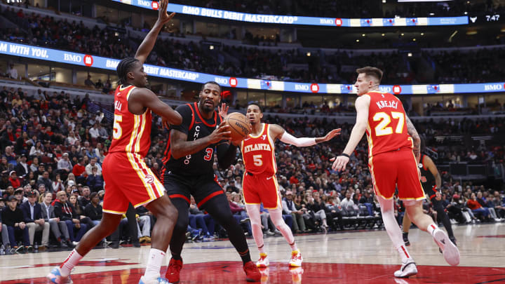 Apr 1, 2024; Chicago, Illinois, USA; Chicago Bulls center Andre Drummond (3) goes to the basket against the Atlanta Hawks during the first half at United Center. Mandatory Credit: Kamil Krzaczynski-USA TODAY Sports