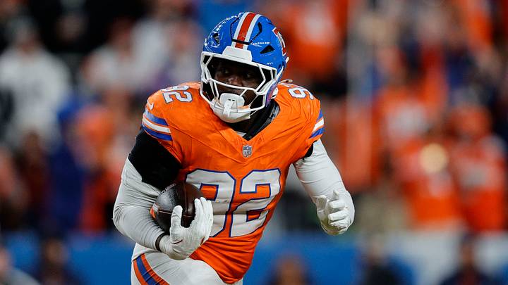 Nov 6, 2025; Denver, Colorado, USA; Denver Broncos linebacker Dondrea Tillman (92) runs with the ball after a fumble against the Las Vegas Raiders during the second half at Empower Field at Mile High. Mandatory Credit: Isaiah J. Downing-Imagn Images Nov 6, 2025; Denver, Colorado, USA; Denver Broncos linebacker Dondrea Tillman (92) runs with the ball after a fumble against the Las Vegas Raiders during the second half at Empower Field at Mile High. Mandatory Credit: Isaiah J. Downing-Imagn Images