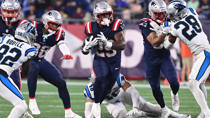 August 8, 2024; Foxborough, MA, USA;  New England Patriots running back Terrell Jennings (29) runs the ball against the Carolina Panthers during the second half at Gillette Stadium. Mandatory Credit: Eric Canha-Imagn Images