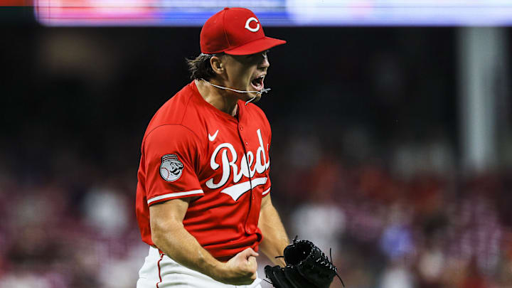 Sep 23, 2025; Cincinnati, Ohio, USA; Cincinnati Reds relief pitcher Connor Phillips (34) reacts after a play in the sixth inning against the Pittsburgh Pirates at Great American Ball Park. Mandatory Credit: Katie Stratman-Imagn Images