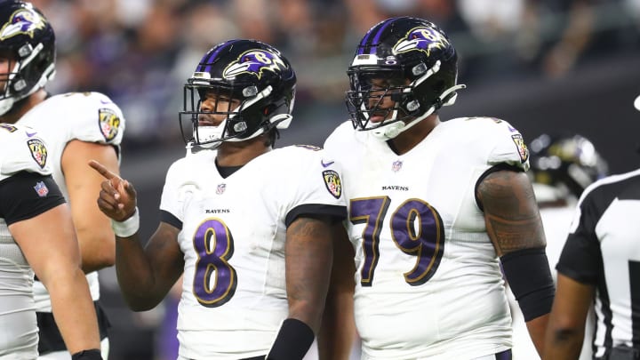 Sep 13, 2021; Paradise, Nevada, USA; Baltimore Ravens quarterback Lamar Jackson (8) and offensive tackle Ronnie Stanley (79) against the Las Vegas Raiders during Monday Night Football at Allegiant Stadium. Mandatory Credit: Mark J. Rebilas-USA TODAY Sports Sep 13, 2021; Paradise, Nevada, USA; Baltimore Ravens quarterback Lamar Jackson (8) and offensive tackle Ronnie Stanley (79) against the Las Vegas Raiders during Monday Night Football at Allegiant Stadium. Mandatory Credit: Mark J. Rebilas-USA TODAY Sports