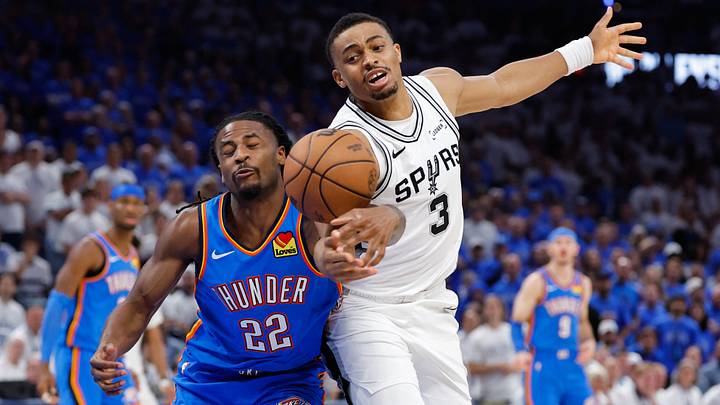 May 20, 2026; Oklahoma City, Oklahoma, USA; Oklahoma City Thunder guard Cason Wallace (22) and San Antonio Spurs forward Keldon Johnson (3) battle for the ball during the fourth quarter during game two of the western conference finals for the 2026 NBA playoffs at Paycom Center. Mandatory Credit: Alonzo Adams-Imagn Images May 20, 2026; Oklahoma City, Oklahoma, USA; Oklahoma City Thunder guard Cason Wallace (22) and San Antonio Spurs forward Keldon Johnson (3) battle for the ball during the fourth quarter during game two of the western conference finals for the 2026 NBA playoffs at Paycom Center. Mandatory Credit: Alonzo Adams-Imagn Images