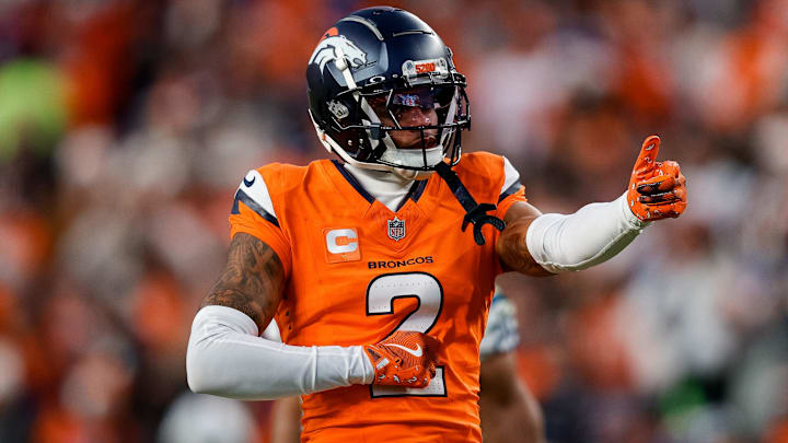 Dec 15, 2024; Denver, Colorado, USA; Denver Broncos cornerback Pat Surtain II (2) gestures after a play in the third quarter against the Indianapolis Colts at Empower Field at Mile High. Mandatory Credit: Isaiah J. Downing-Imagn Images