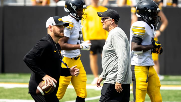 Aug 9, 2025; Iowa defensive coordinator Phil Parker walks down the field during the Hawkeyes Kids Day NCAA football open practice at Kinnick Stadium in Iowa City, Iowa. Mandatory Credit: Joseph Cress for the Des Moines Register Aug 9, 2025; Iowa defensive coordinator Phil Parker walks down the field during the Hawkeyes Kids Day NCAA football open practice at Kinnick Stadium in Iowa City, Iowa. Mandatory Credit: Joseph Cress for the Des Moines Register
