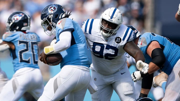 Sep 21, 2025; Nashville, Tennessee, USA; Indianapolis Colts defensive tackle Neville Gallimore (92) sacks Tennessee Titans quarterback Cameron Ward (1) during the second half at Nissan Stadium. Mandatory Credit: Steve Roberts-Imagn Images Sep 21, 2025; Nashville, Tennessee, USA; Indianapolis Colts defensive tackle Neville Gallimore (92) sacks Tennessee Titans quarterback Cameron Ward (1) during the second half at Nissan Stadium. Mandatory Credit: Steve Roberts-Imagn Images