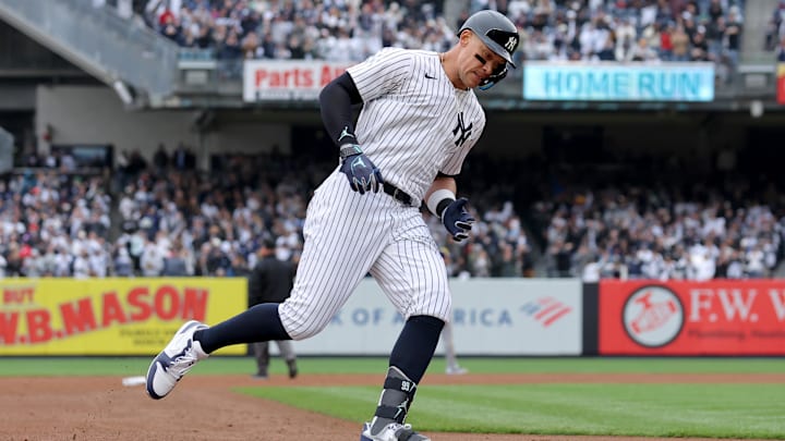 Mar 30, 2025; Bronx, New York, USA; New York Yankees right fielder Aaron Judge (99) rounds the bases after hitting a two run home run against the Milwaukee Brewers during the first inning at Yankee Stadium. 