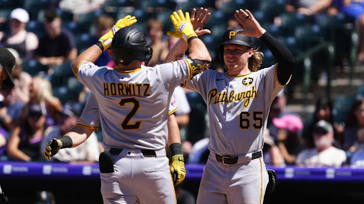 Aug 3, 2025; Denver, Colorado, USA; Pittsburgh Pirates first baseman Spencer Horwitz (2) celebrates his three run home run with right fielder Jack Suwinski (65) in the sixth inning against the Colorado Rockies at Coors Field. Mandatory Credit: Ron Chenoy-Imagn Images Aug 3, 2025; Denver, Colorado, USA; Pittsburgh Pirates first baseman Spencer Horwitz (2) celebrates his three run home run with right fielder Jack Suwinski (65) in the sixth inning against the Colorado Rockies at Coors Field. Mandatory Credit: Ron Chenoy-Imagn Images