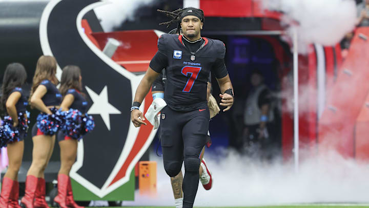 Oct 6, 2024; Houston, Texas, USA; Houston Texans quarterback C.J. Stroud (7) runs onto the field before the game against the Buffalo Bills at NRG Stadium. Mandatory Credit: Troy Taormina-Imagn Images