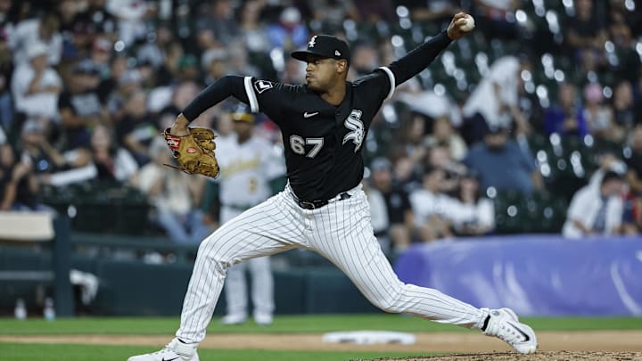 Aug 26, 2023; Chicago, Illinois, USA; Chicago White Sox relief pitcher Sammy Peralta (67) delivers a pitch against the Oakland Athletics during the eight inning at Guaranteed Rate Field. Mandatory Credit: Kamil Krzaczynski-Imagn Images Aug 26, 2023; Chicago, Illinois, USA; Chicago White Sox relief pitcher Sammy Peralta (67) delivers a pitch against the Oakland Athletics during the eight inning at Guaranteed Rate Field. Mandatory Credit: Kamil Krzaczynski-Imagn Images