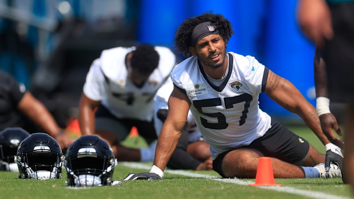 Jacksonville Jaguars linebacker Caleb Johnson (57) stretches Jacksonville Jaguars linebacker.
