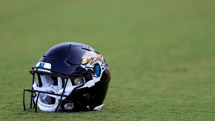 A Jacksonville Jaguars helmet lies on the turf Wednesday, July 26, 2023 at Miller Electric Center at EverBank Stadium in Jacksonville, Fla. Today marked the first day of training camp for the Jacksonville Jaguars.