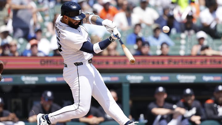 Jul 27, 2025; Detroit, Michigan, USA;  Detroit Tigers second baseman Gleyber Torres (25) hits a three-run home run in the third inning against the Toronto Blue Jays at Comerica Park.