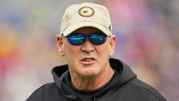Nov 1, 2025; Lawrence, Kansas, USA; Kansas Jayhawks head coach Lance Leipold prior to a game against the Oklahoma State Cowboys at David Booth Kansas Memorial Stadium. Mandatory Credit: Jay Biggerstaff-Imagn Images Nov 1, 2025; Lawrence, Kansas, USA; Kansas Jayhawks head coach Lance Leipold prior to a game against the Oklahoma State Cowboys at David Booth Kansas Memorial Stadium. Mandatory Credit: Jay Biggerstaff-Imagn Images