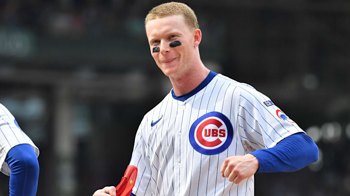 Aug 16, 2025; Chicago, Illinois, USA; Chicago Cubs center fielder Pete Crow-Armstrong (4) reacts after getting hit by a pitch during the sixth inning against the Pittsburgh Pirates at Wrigley Field. Mandatory Credit: Patrick Gorski-Imagn Images