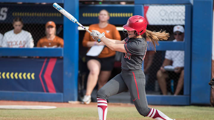 Jun 3, 2024; Oklahoma City, OK, USA; Stanford Cardinals infielder Jade Berry (10) gets a single in the second inning against the Texas Longhorns during a Women's College World Series softball semifinal game at Devon Park. Mandatory Credit: Brett Rojo-Imagn Images Jun 3, 2024; Oklahoma City, OK, USA; Stanford Cardinals infielder Jade Berry (10) gets a single in the second inning against the Texas Longhorns during a Women's College World Series softball semifinal game at Devon Park. Mandatory Credit: Brett Rojo-Imagn Images