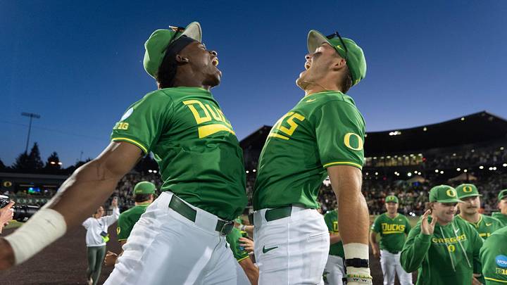Oregon’s Elijah Cook, left, and Jack Brooks celebrate winning the NCAA Eugene Regional tournament after defeating Oregon State on day three at PK Park in Eugene May 31, 2026.