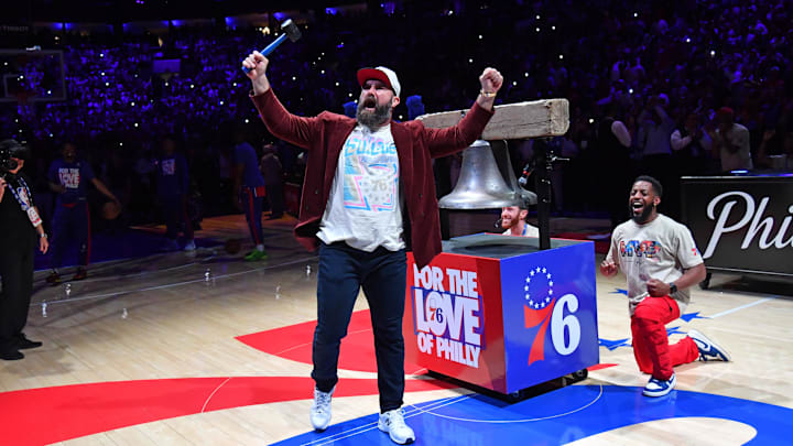May 5, 2023; Philadelphia, Pennsylvania, USA; Philadelphia Eagles center Jason Kelce encourages the crowd before ringing the bell against the Boston Celtics before game three of the 2023 NBA playoffs at Wells Fargo Center. Mandatory Credit: Eric Hartline-Imagn Images