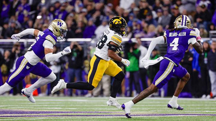 Oct 9, 2026; Seattle, Washington, USA; Iowa Hawkeyes running back Kamari Moulton (28) rushes for a touchdown against the Washington Huskies during the first quarter at Husky Stadium. Mandatory Credit: Joe Nicholson-Imagn Images