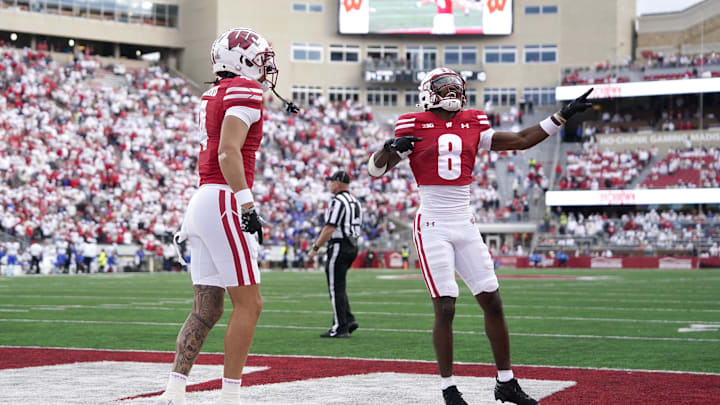 Sep 6, 2025; Madison, Wisconsin, USA; Wisconsin Badgers wide receiver Vinny Anthony II (8) reacts to a touchdown by Wisconsin Badgers wide receiver Jayden Ballard, left, during the second half at Camp Randall Stadium. Mandatory Credit: Kayla Wolf-Imagn Images
