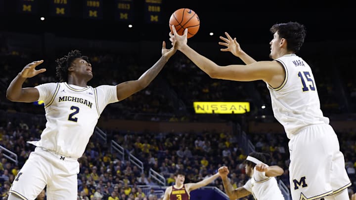 Michigan is a road favorite against Illinois on Friday night.