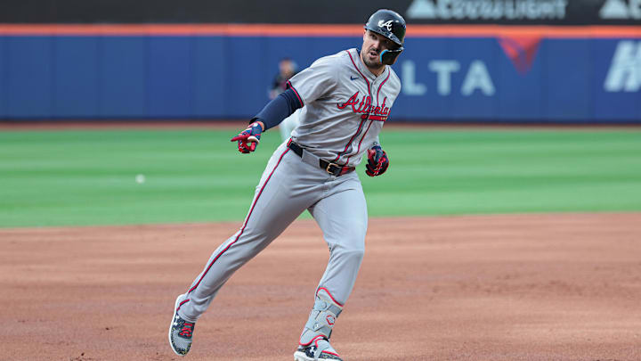 Jul 26, 2024; New York City, New York, USA; Atlanta Braves right fielder Adam Duvall (14) rounds third base after hitting a two run home run during the second inning against the New York Mets at Citi Field. Mandatory Credit: Vincent Carchietta-Imagn Images