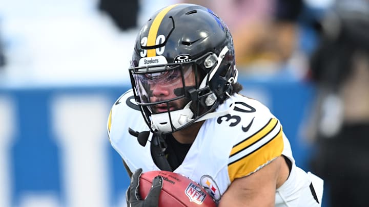 Jan 15, 2024; Orchard Park, New York, USA; Pittsburgh Steelers running back Jaylen Warren (30) warms up before the game against the Buffalo Bills in a 2024 AFC wild card game at Highmark Stadium. Mandatory Credit: Mark Konezny-USA TODAY Sports Jan 15, 2024; Orchard Park, New York, USA; Pittsburgh Steelers running back Jaylen Warren (30) warms up before the game against the Buffalo Bills in a 2024 AFC wild card game at Highmark Stadium. Mandatory Credit: Mark Konezny-USA TODAY Sports