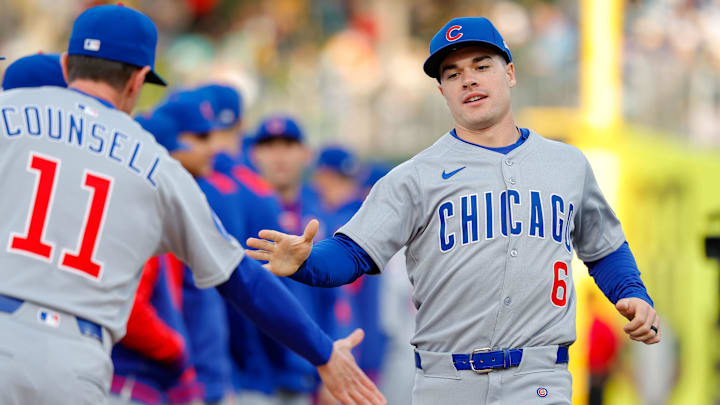 Chicago Cubs third baseman Matt Shaw (6) high-fives manager Craig Counsell against the Athletics at Sutter Health Park. 
