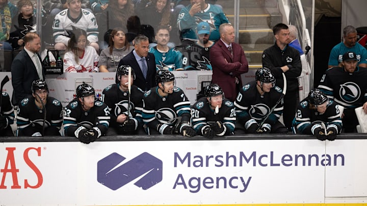 Oct 12, 2024; San Jose, California, USA; The San Jose Sharks bench watches their teammates take on the Anaheim Ducks during the third period at SAP Center at San Jose. Mandatory Credit: D. Ross Cameron-Imagn Images