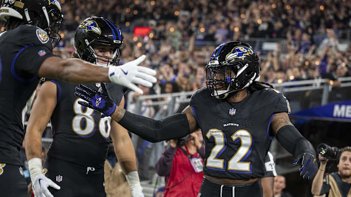 Henry celebrated with teammates after scoring on an 87-yard touchdown run against the Bills on Sunday night. He finished with 199 rushing yards.