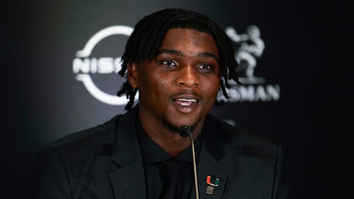 Dec 14, 2024; New York, NY, USA; Miami Hurricanes quarterback Cam Ward speaks on stage during a press conference before the 2024 Heisman Trophy Presentation. Mandatory Credit: Lucas Boland-Imagn Images