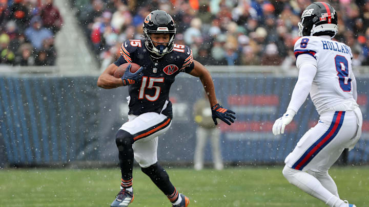 Nov 9, 2025; Chicago, Illinois, USA; Chicago Bears wide receiver Rome Odunze (15) makes a catch against New York Giants safety Jevon Holland (8) during the first half at Soldier Field. Mandatory Credit: Mike Dinovo-Imagn Images