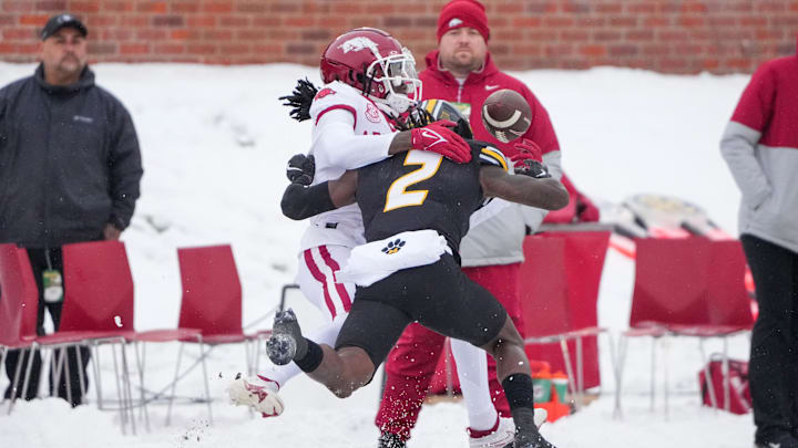 Nov 30, 2024; Columbia, Missouri, USA; Missouri Tigers cornerback Toriano Pride Jr. (2) breaks up a pass intended for Arkansas Razorbacks wide receiver Andrew Armstrong (2) during the first half at Faurot Field at Memorial Stadium. Mandatory Credit: Denny Medley-Imagn Images