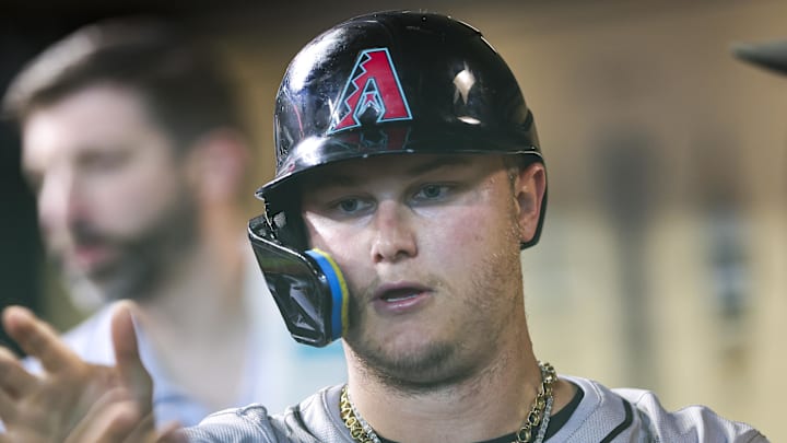 Sep 8, 2024; Houston, Texas, USA; Arizona Diamondbacks designated hitter Joc Pederson (3) celebrates in the dugout after scoring a run during the third inning against the Houston Astros at Minute Maid Park. Mandatory Credit: Troy Taormina-Imagn Images