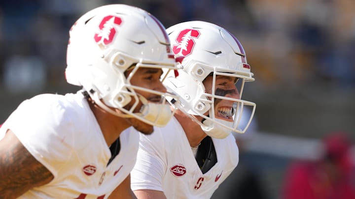 Nov 23, 2024; Berkeley, California, USA; Stanford Cardinal quarterback Justin Lamson (right) jogs onto the field with quarterback Ashton Daniels (left) before the game against the California Golden Bears at California Memorial Stadium. Mandatory Credit: Darren Yamashita-Imagn Images Nov 23, 2024; Berkeley, California, USA; Stanford Cardinal quarterback Justin Lamson (right) jogs onto the field with quarterback Ashton Daniels (left) before the game against the California Golden Bears at California Memorial Stadium. Mandatory Credit: Darren Yamashita-Imagn Images