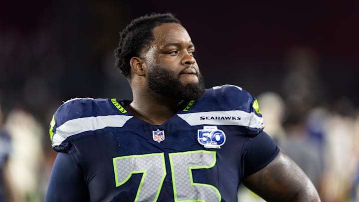 Sep 25, 2025; Glendale, Arizona, USA; Seattle Seahawks guard Anthony Bradford (75) against the Arizona Cardinals at State Farm Stadium. Mandatory Credit: Mark J. Rebilas-Imagn Images