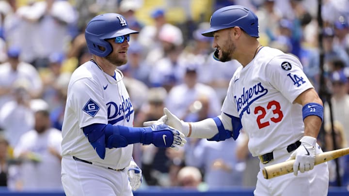 Apr 30, 2025; Los Angeles, California, USA; Los Angeles Dodgers third base Max Muncy (13) is congratulated by left fielder Michael Conforto (23) after hitting a home run against the Miami Marlins at Dodger Stadium. Mandatory Credit: Jayne Kamin-Oncea-Imagn Images Apr 30, 2025; Los Angeles, California, USA; Los Angeles Dodgers third base Max Muncy (13) is congratulated by left fielder Michael Conforto (23) after hitting a home run against the Miami Marlins at Dodger Stadium. Mandatory Credit: Jayne Kamin-Oncea-Imagn Images