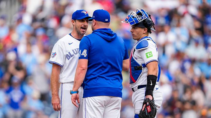 Toronto Blue Jays pitcher Max Scherzer exchanges words with manager John Schneider. Mandatory Credit: Kevin Sousa-Imagn Images Toronto Blue Jays pitcher Max Scherzer exchanges words with manager John Schneider. Mandatory Credit: Kevin Sousa-Imagn Images